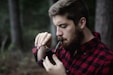 man smoking smoking pipe