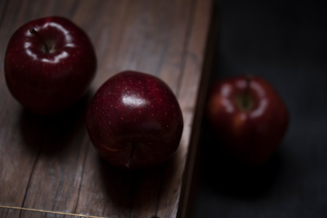 three red delicious apples