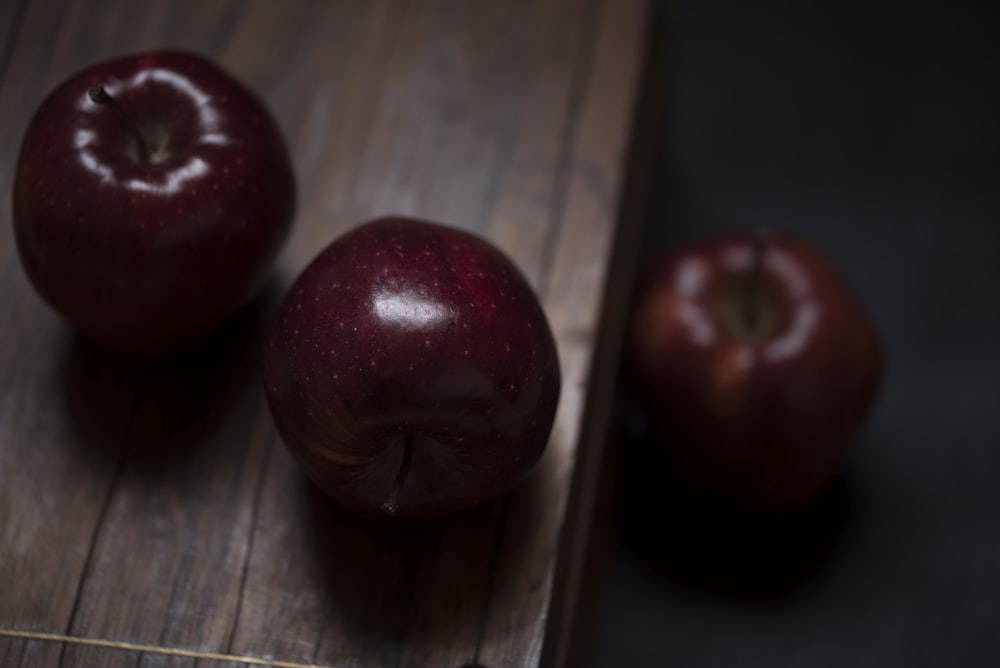 three red delicious apples