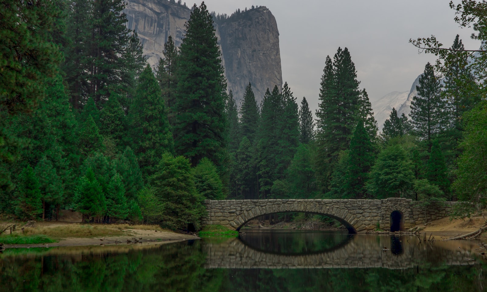 Sony E PZ 18-105mm F4 G OSS sample photo. Reflection of concrete bridge photography