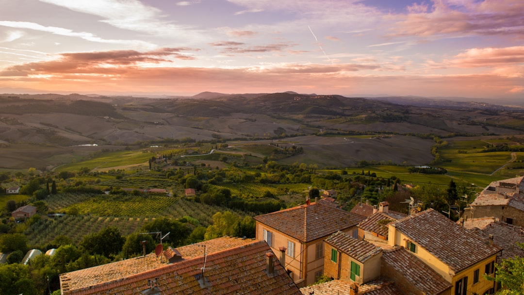 aerial photography of mansion near grass field, european village