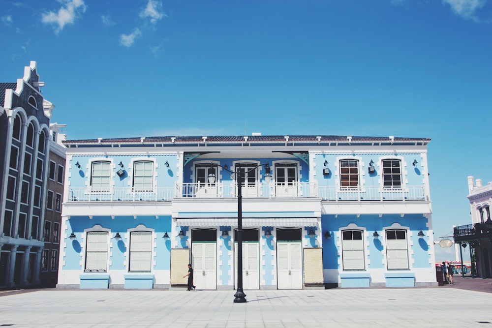 white concrete building under blue sky during daytime