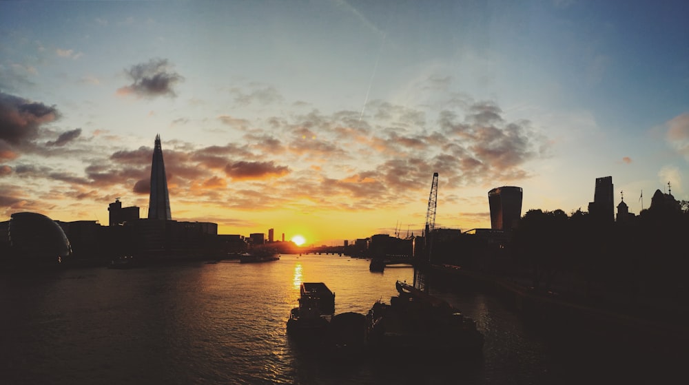 silhouette of buildings near water