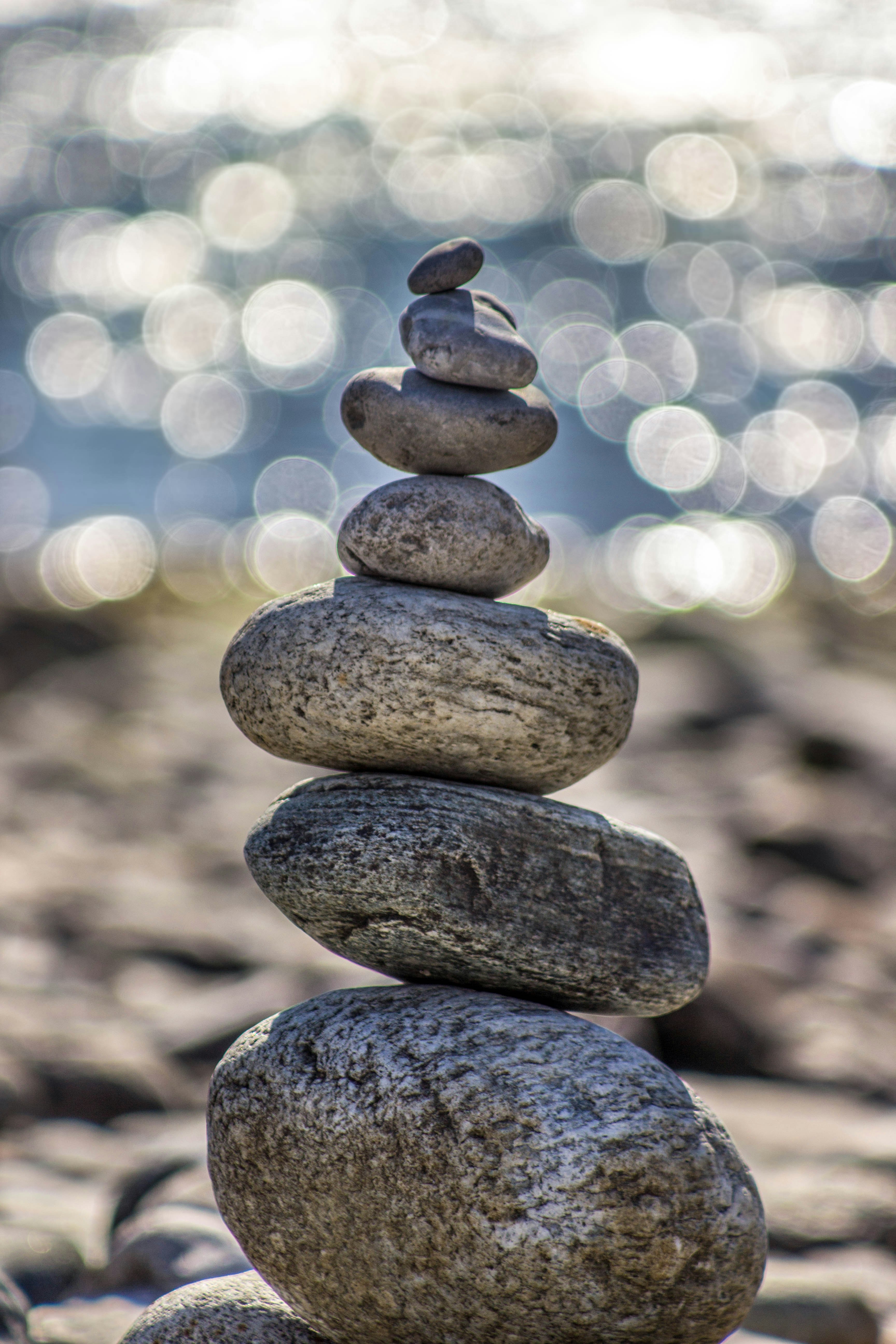 Stacked stones by water