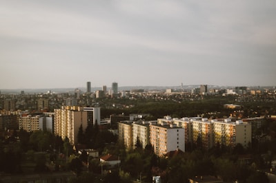 A panoramic view of a city skyline with various residential buildings.