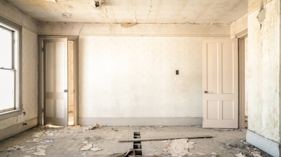 gray concrete walls with broken floor