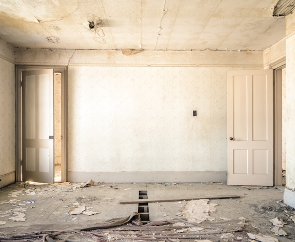 gray concrete walls with broken floor