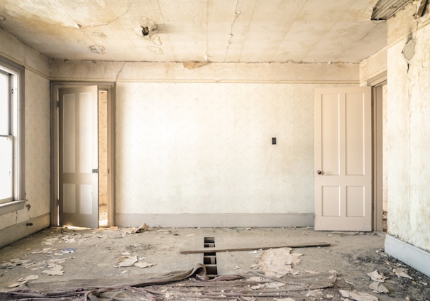 gray concrete walls with broken floor