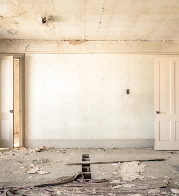 gray concrete walls with broken floor