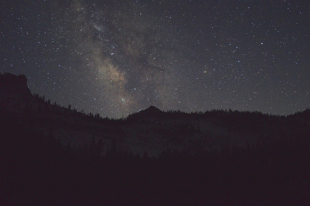 silhouette of a mountain during night