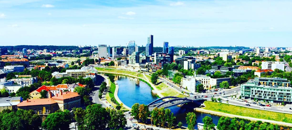 aerial photography of buildings and river at daytime