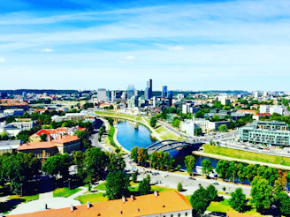 aerial photography of buildings and river at daytime