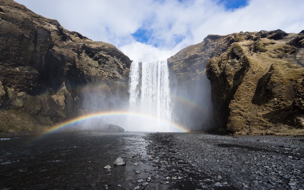 timelapsed photo of waterfall