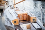 white and brown motorboat near dock