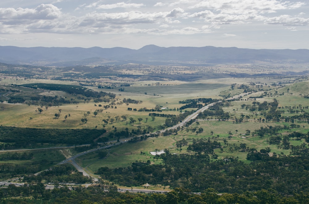 aerial photography of long winding road