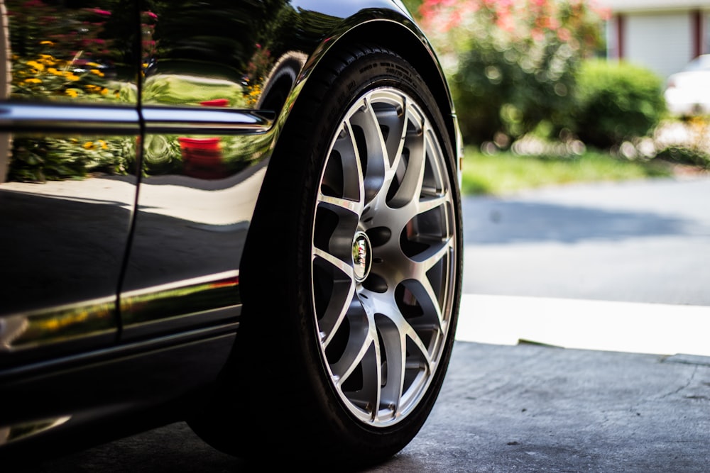 gray vehicle rim with tire