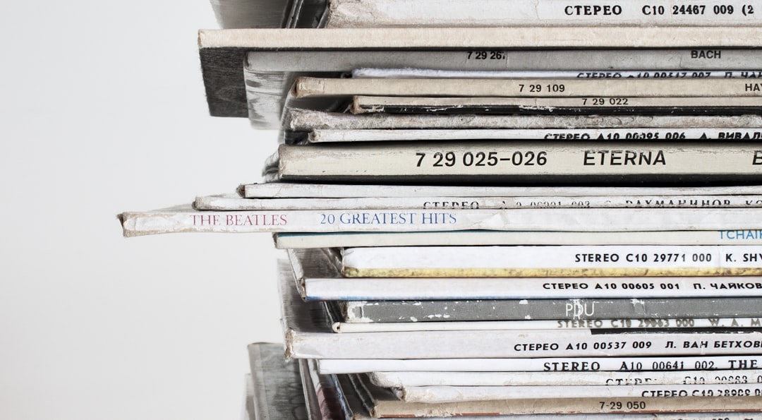 stack of white books, Vintage vinyl records