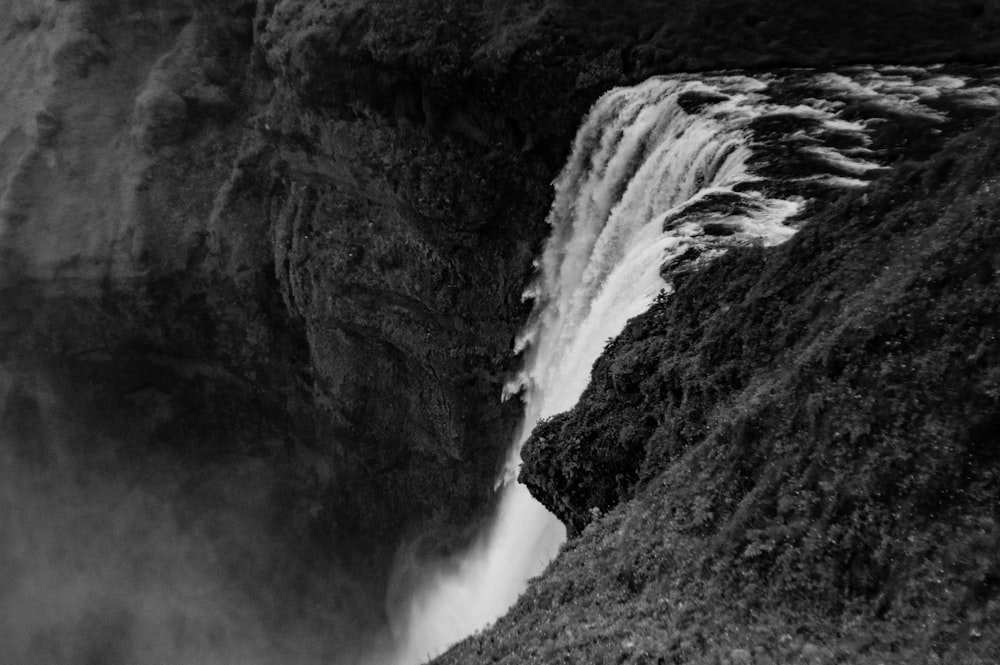 grayscale photo of waterfalls