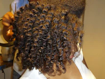 Close-up of shiny, smooth hair after a professional blowout at Mirely Beauty.