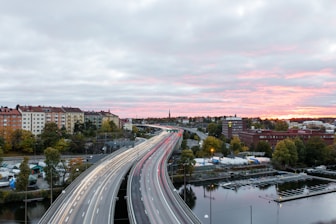 aerial photograph of concrete bridge road in city