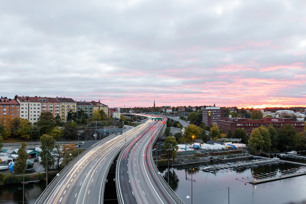 aerial photograph of concrete bridge road in city