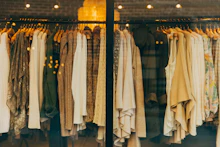 Clothing arranged on a thrift-store rail