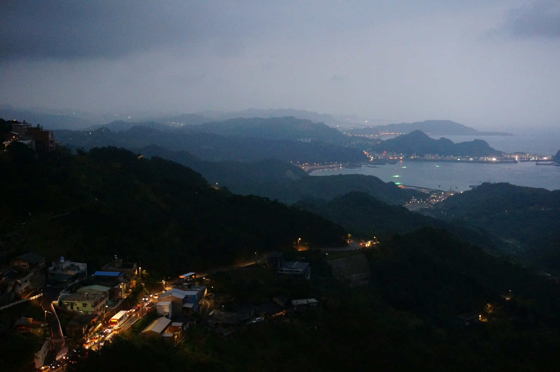 woman wearing yellow long-sleeved dress under white clouds and blue sky during daytime