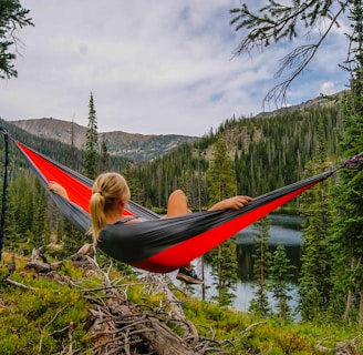 woman on hammock near to river