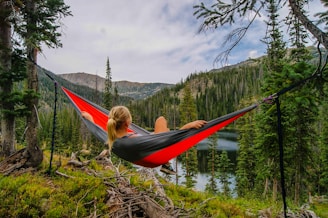 woman on hammock near to river