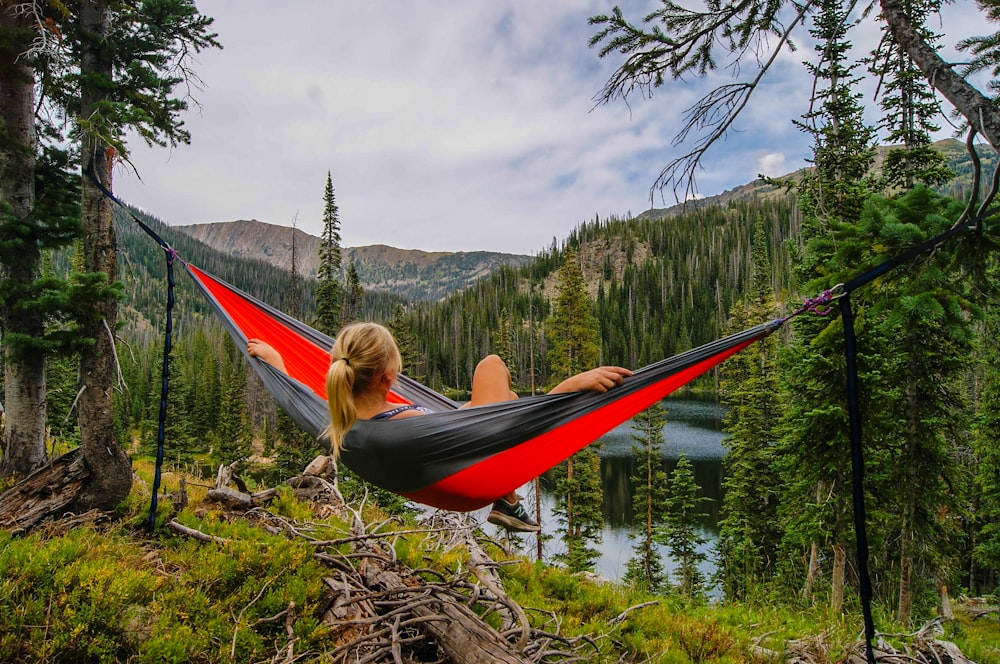 woman on hammock near to river