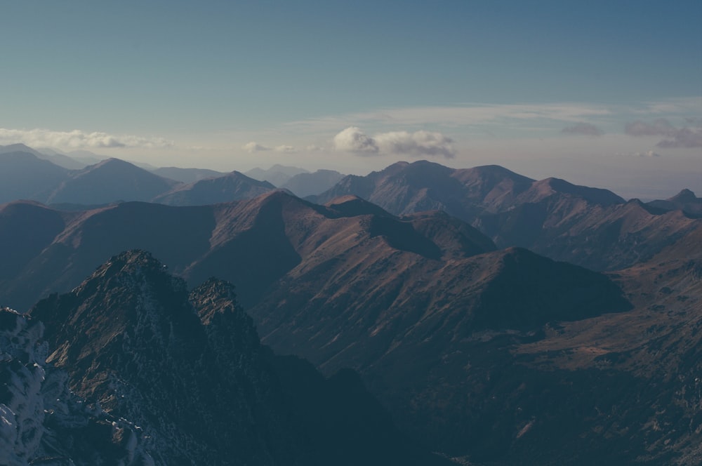 aerial photo of brown mountain under gray sky