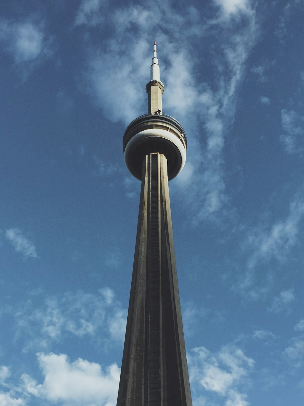 white concrete tower under blue sky at daytime