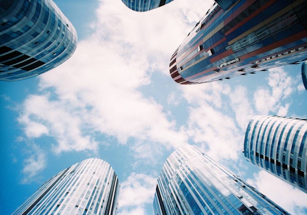 low angle photography of high rise buildings