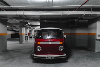 white and red car parking on parking lot