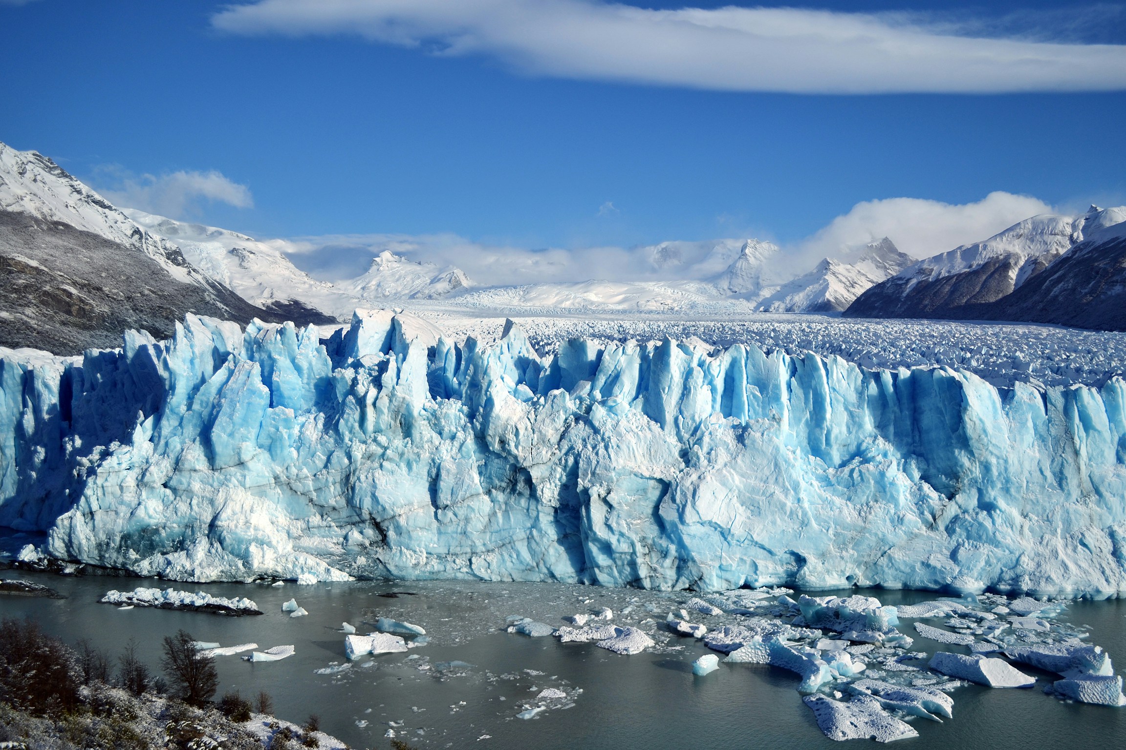 mountain covered snow, River by a mountain glacier