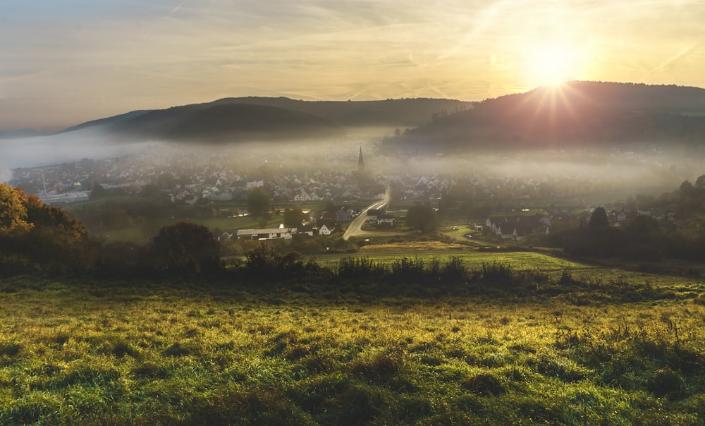 cityscape with fogs during daytime