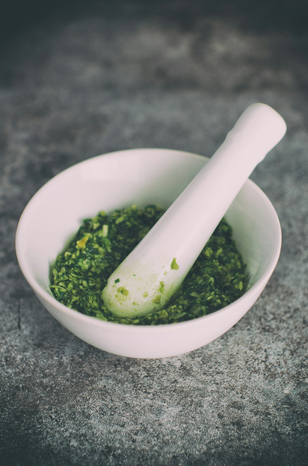 vegetable grind in mortar and pestle