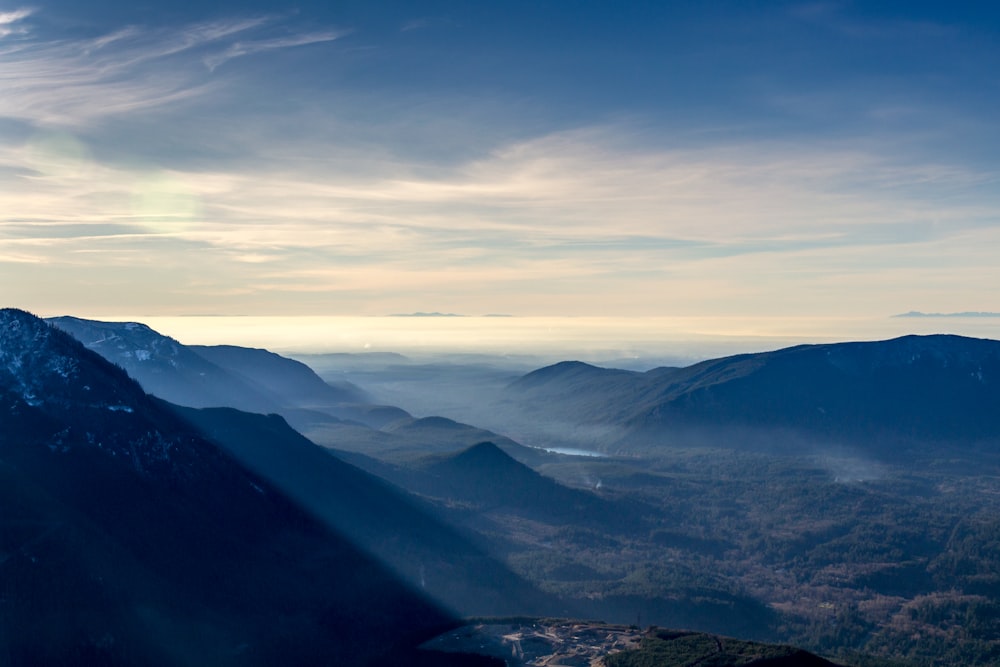 mountain covered by fogs