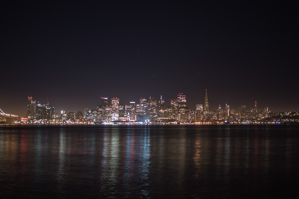 city skyline during night time