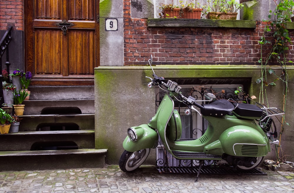 motor scooter parked near house