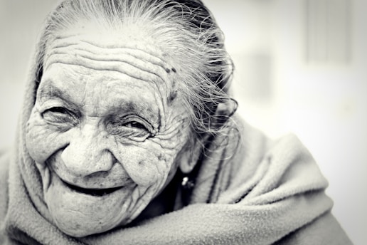 Smiling elderly woman, symbolizing life and time