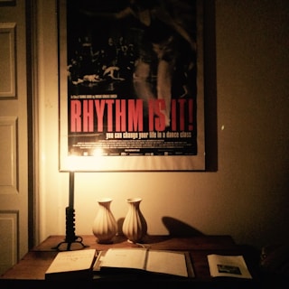 A large-format eq connect poster displayed prominently on a family room wall, inviting calm and connection.