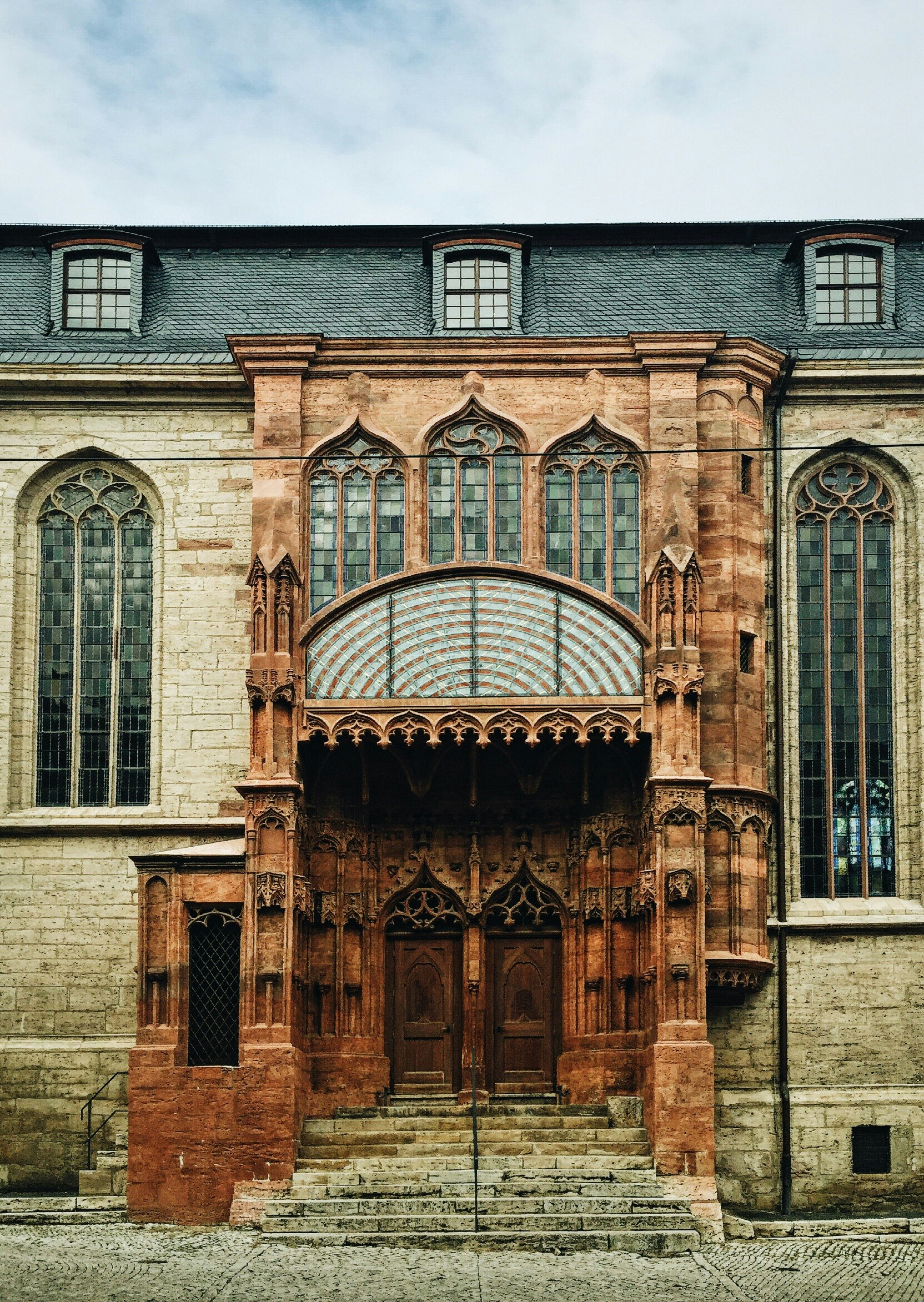 architectural photography of brown stone building