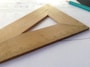 brown wooden triangle ruler