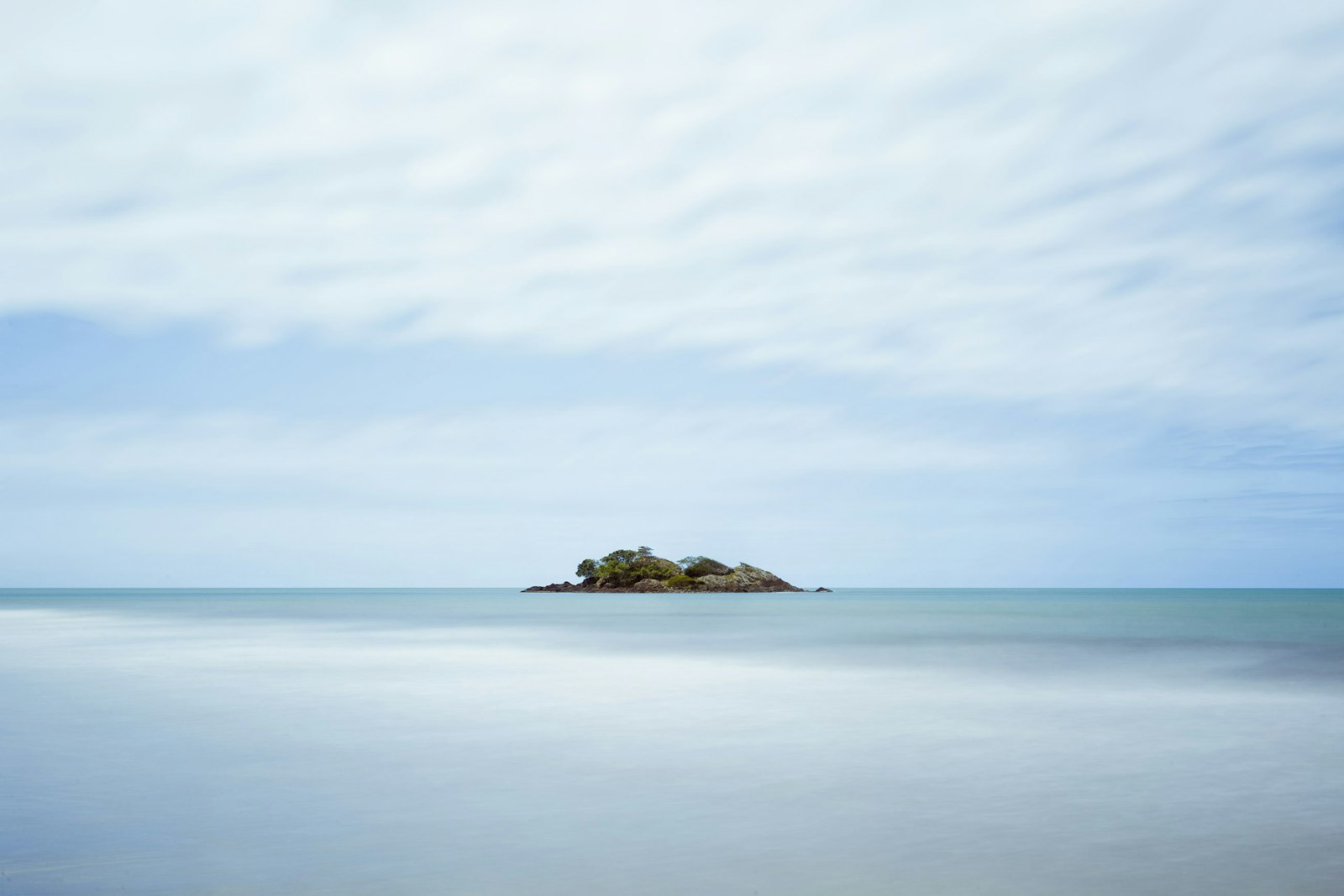 Canon EOS 6D + Canon EF 17-40mm F4L USM sample photo. Brown stone in sea photography