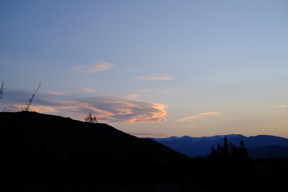 silhouette mountain during golden hour