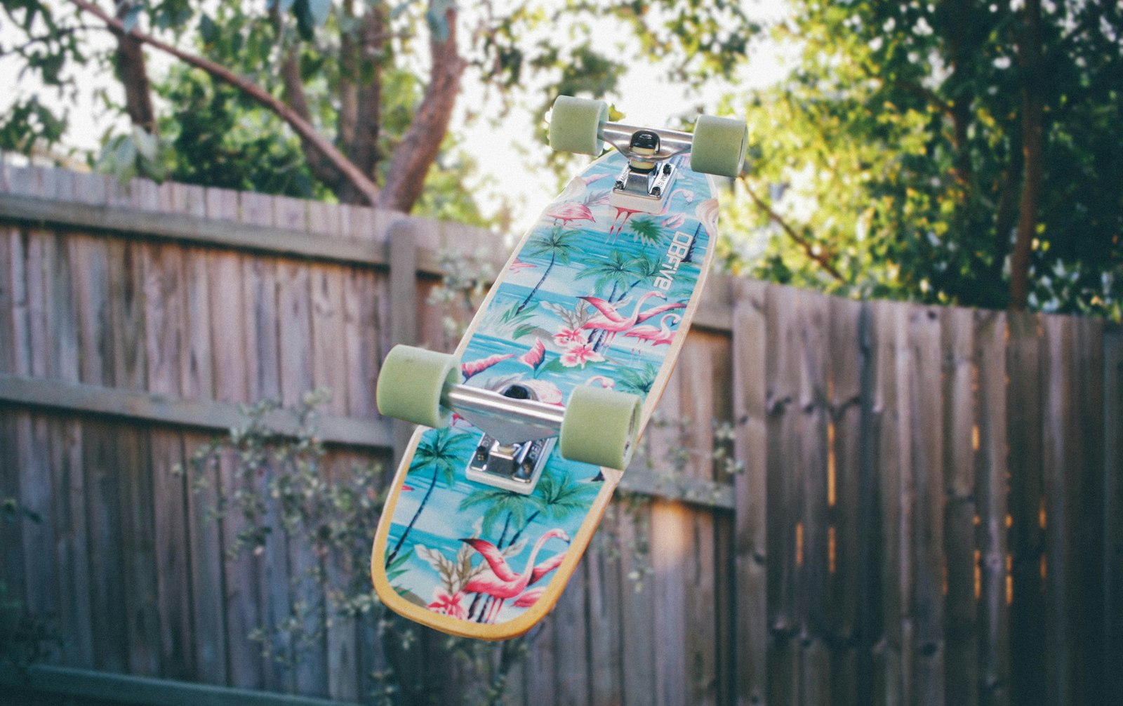 Canon EOS 70D + Canon EF-S 24mm F2.8 STM sample photo. Skateboard flipped near wooden photography