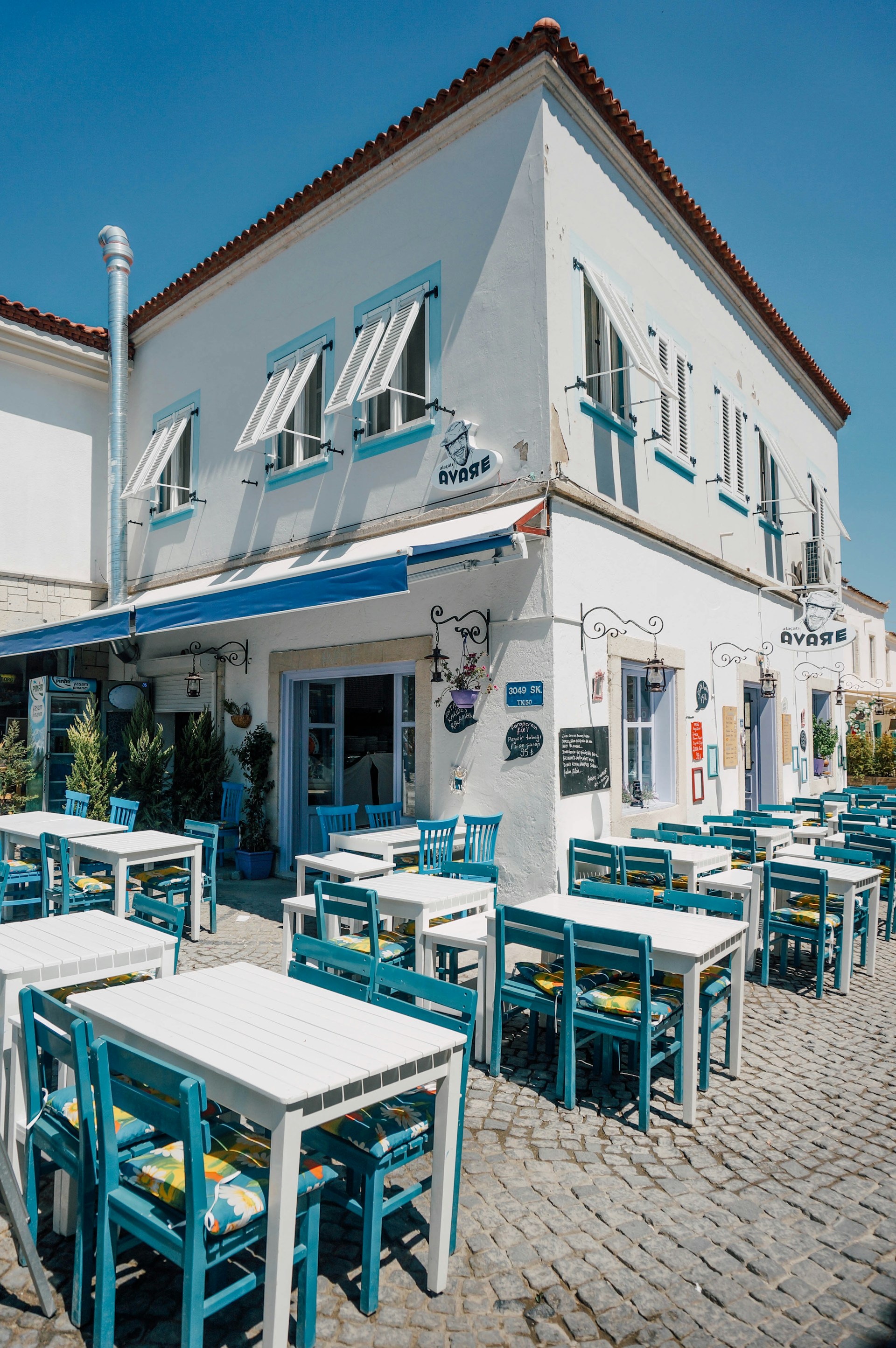 woman wearing yellow long-sleeved dress under white clouds and blue sky during daytime