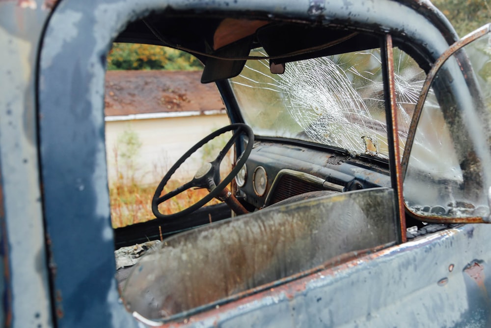 wrecked vehicle with broken windshield