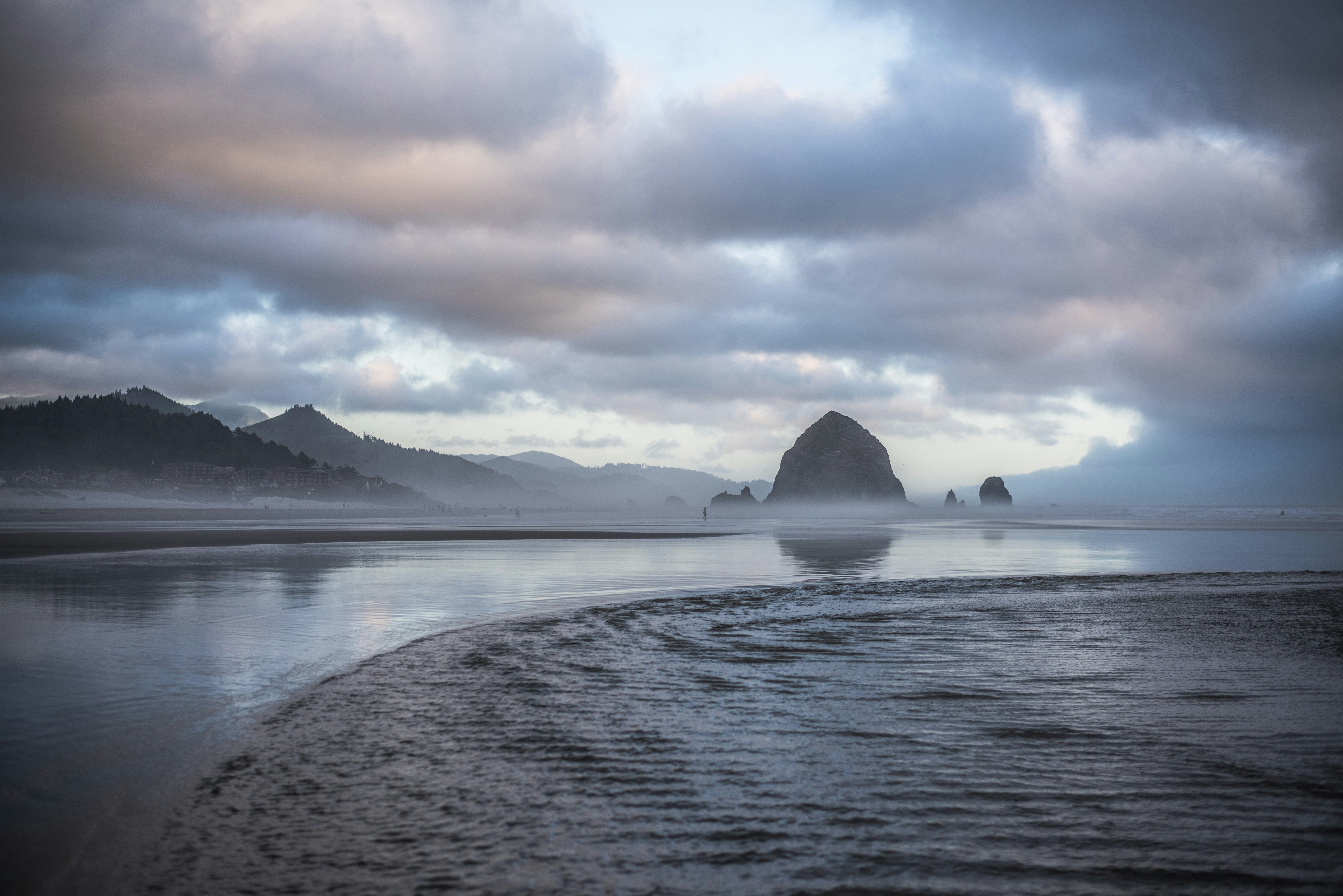 body of water near mountain, Morning at the Canon beach